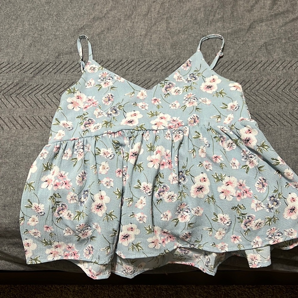 Baby blue floral tank top.